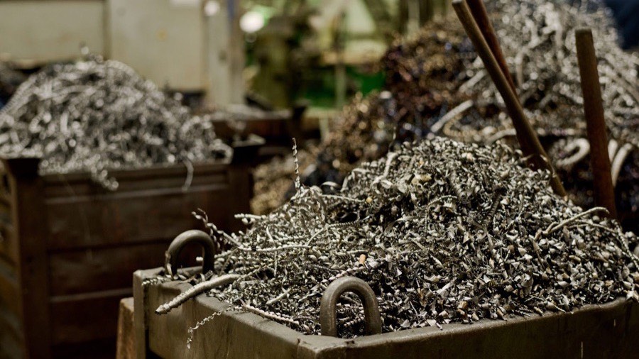 Bins of non-ferrous metal turnings at a processing works
